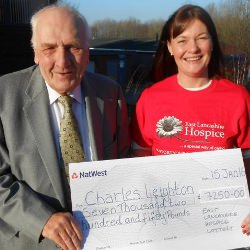 Picture Of Blackburn lottery winner to donate winnings to charity - after buying himself a new coat Picture Of Blackburn lottery winner to donate winnings to charity - after buying himself a new coat